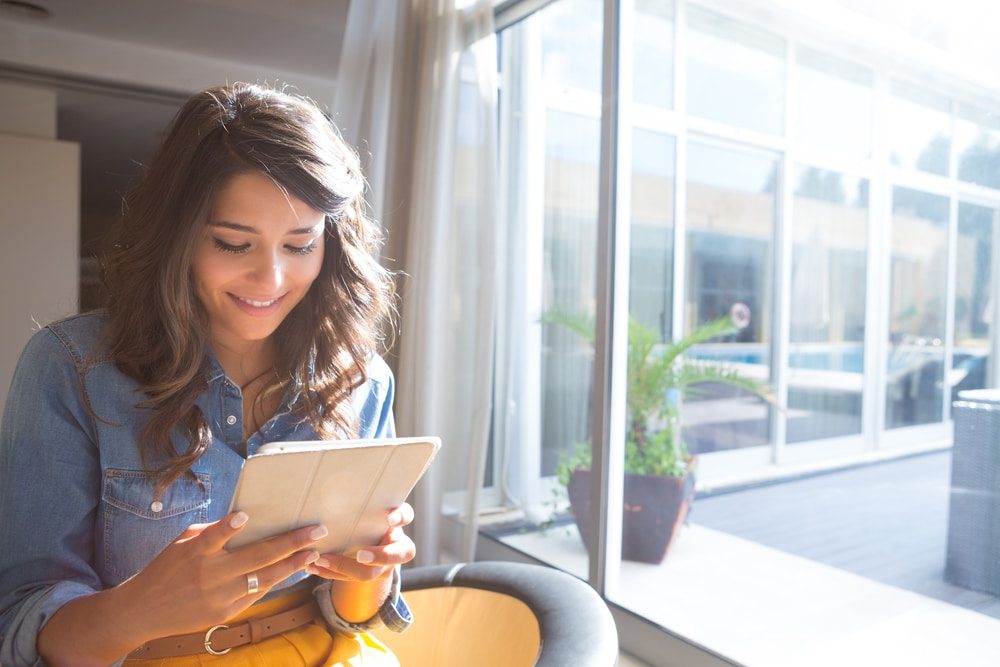 Customer browsing finance options on tablet